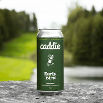 Caddie Early Bird with golf course in background